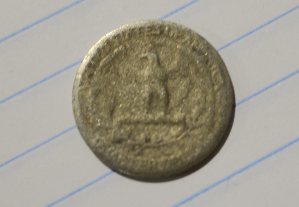 1942-Quarter-Capped-Die?-Damage?-Or-Something-Else.